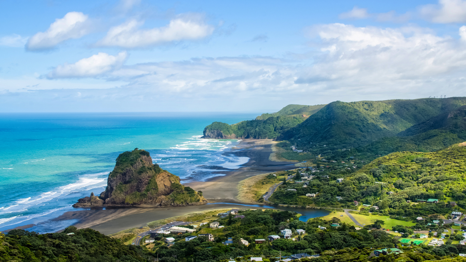 View of the coast and hills in Auckland, New Zealand.